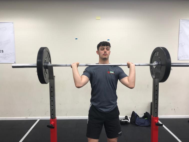 Daniel Davies prepares to lift